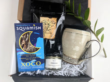 Load image into Gallery viewer, When we can't give a hug in person lets give a Hug in a Mug.   This versatile gift is welcomed by all as you can chop and change as you like.  Choose from A cream or green Emily Tolmie mug, Lucas teas or counterpart coffee, Xoco West Coast Chocolate or a Hollow Tree Candle.   Our gifts come beautifully wrapped with a bow along with an art card including your personal note. gift basket delivery  a box full of snacks  a little gift  a little something  anniversary gifts  amazing gifts  bath salts  BC  beautif