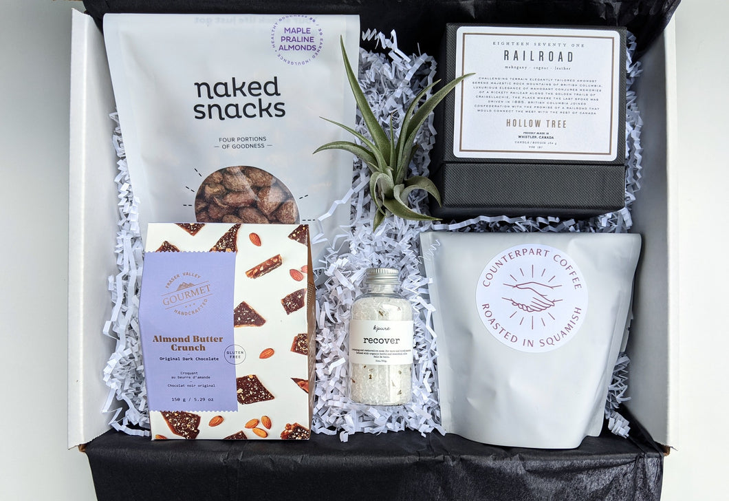 Give the gift of relaxation.  Spoil your loved one with a Hollow Tree Candle, Maple Almonds, Counterpart Coffee Beans, Bath Salts, Almond Butter Crunch and an air plant.  Our gifts come beautifully wrapped with a bow along with an art card including your personalized note.